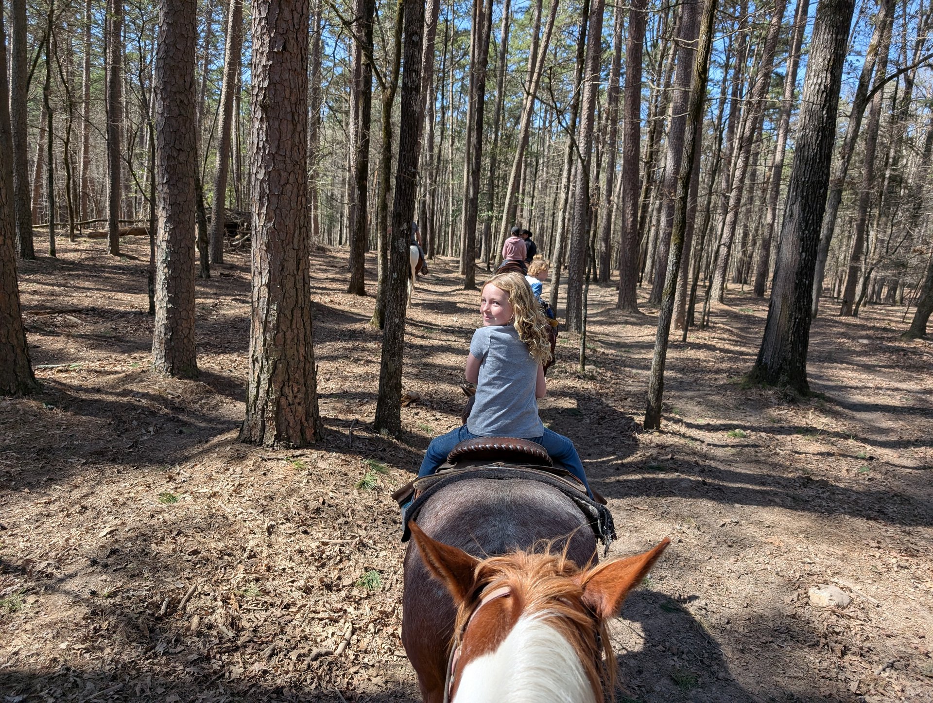 Luna and Emmett horseback riding