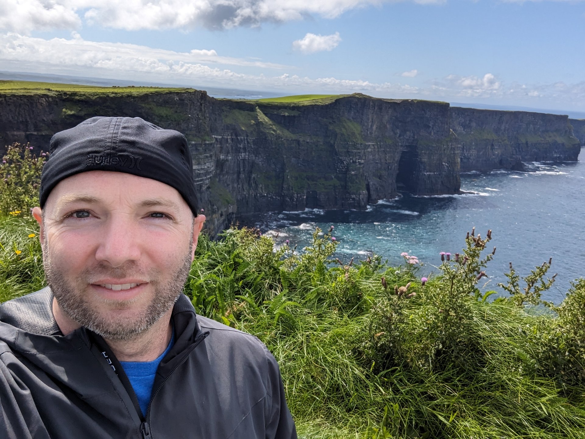 Standing at the edge of the world at the Cliffs of Moher