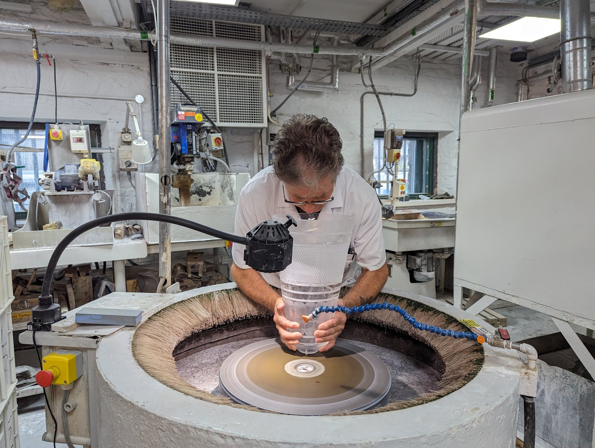 Master craftsman cutting crystal at Waterford