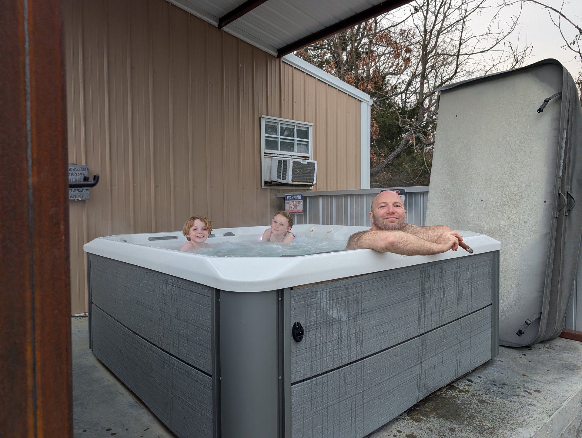 Dan and the kids braving the hot tub at 23 degrees on our first evening