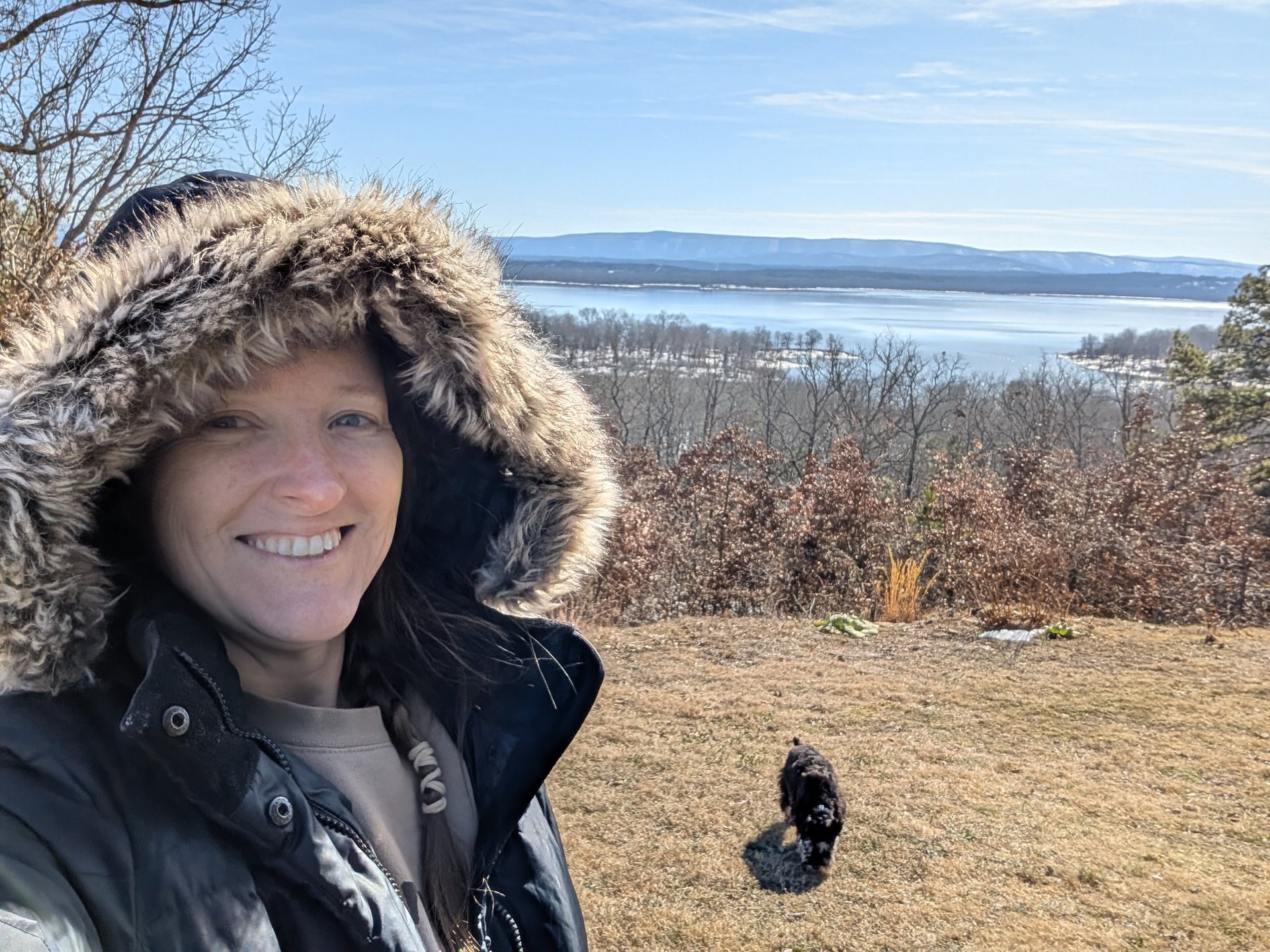 Bundled up with Broc and the lake stretching out behind us on a bluebird Saturday