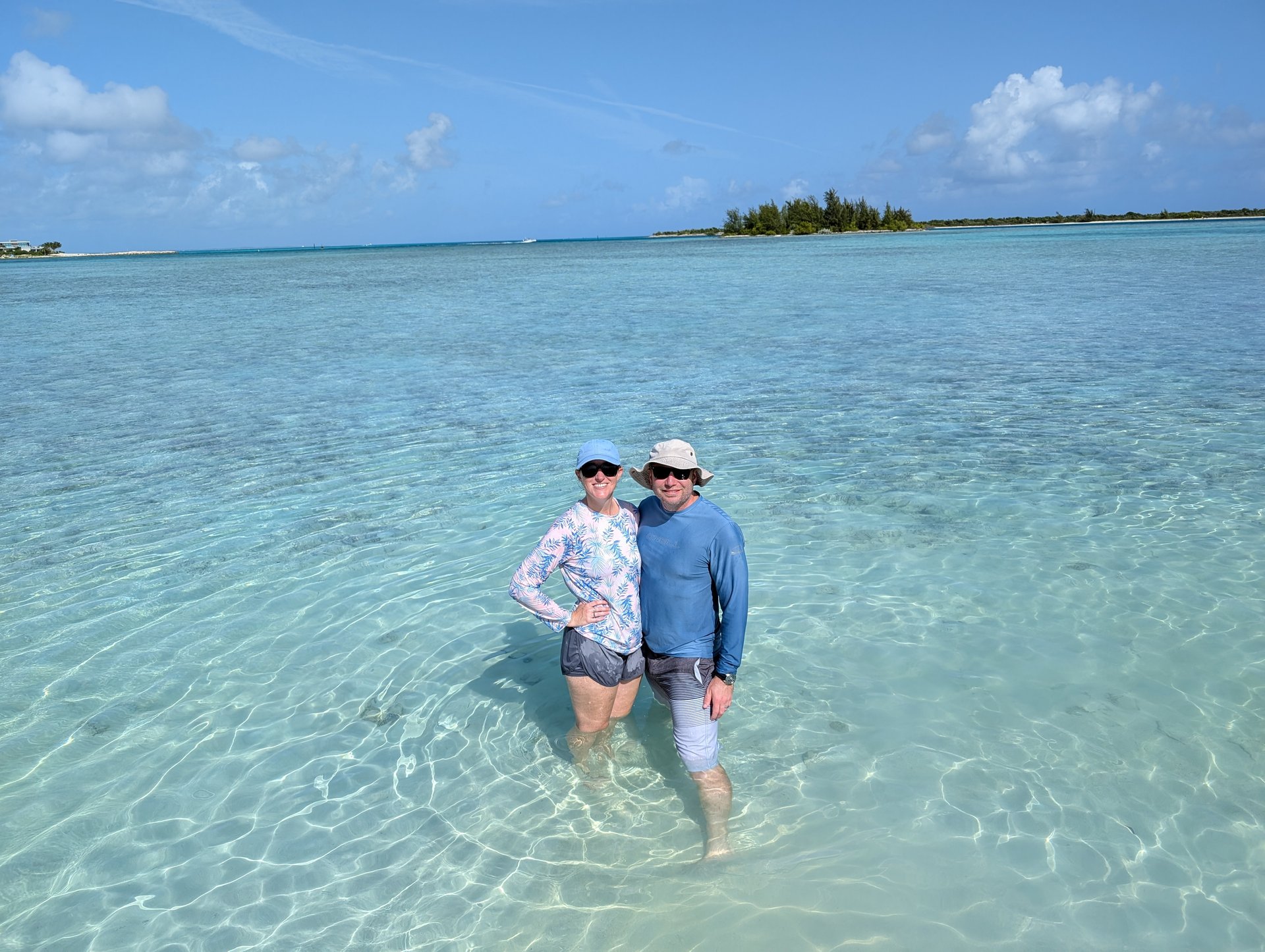 Standing in the turquoise waters during our kayak tour